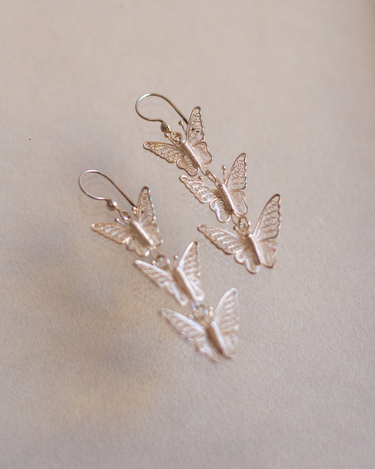 Butterfly filigree earrings