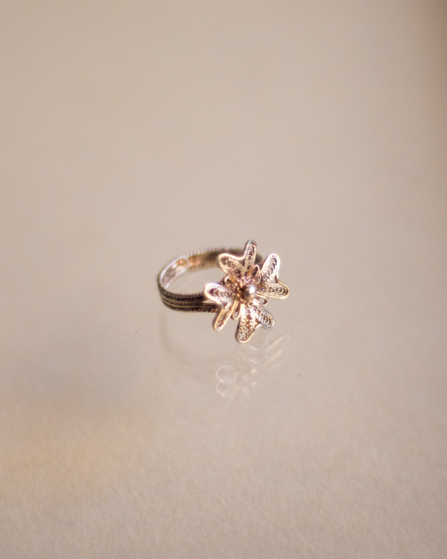 Silver ring with flower