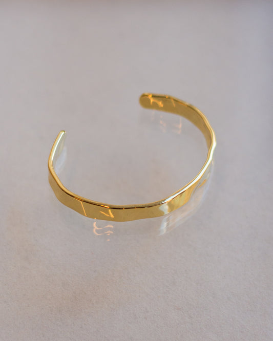 Gold pleated textured hand cuff