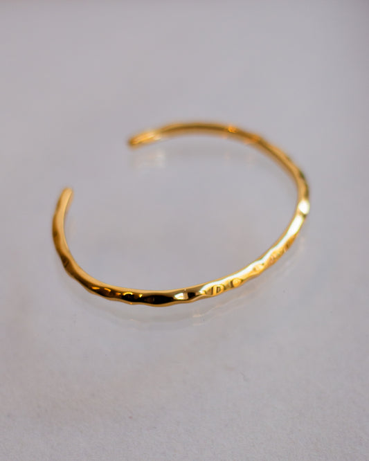 Gold pleated slim textured cuff bracelet