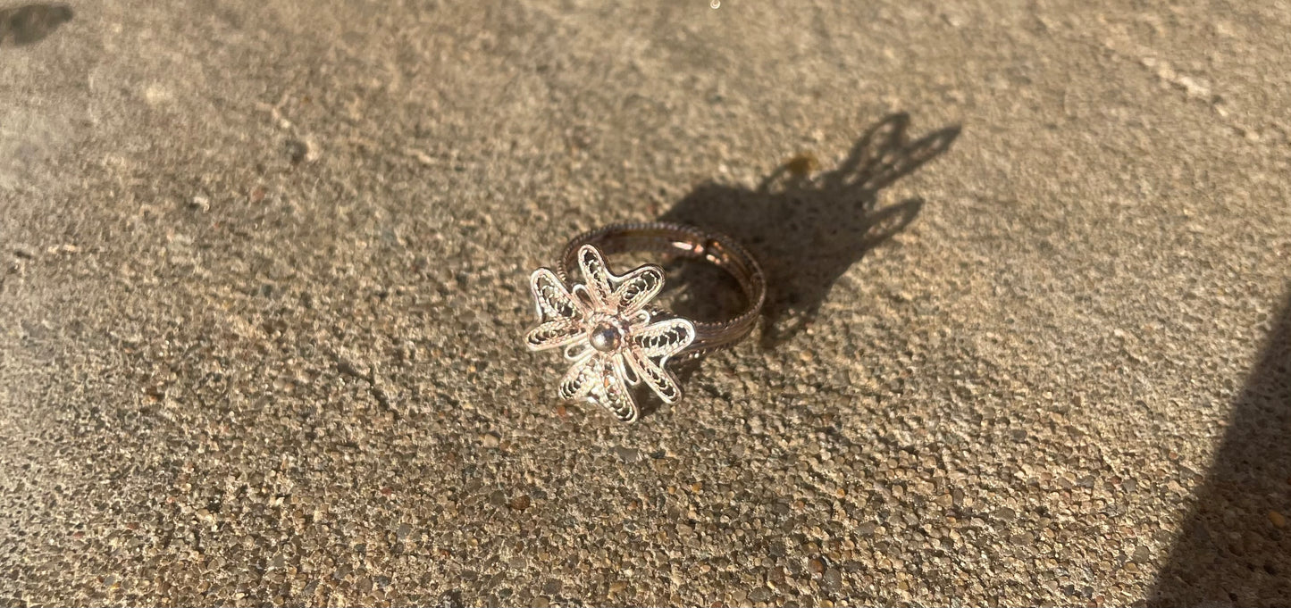 Silver ring with flower