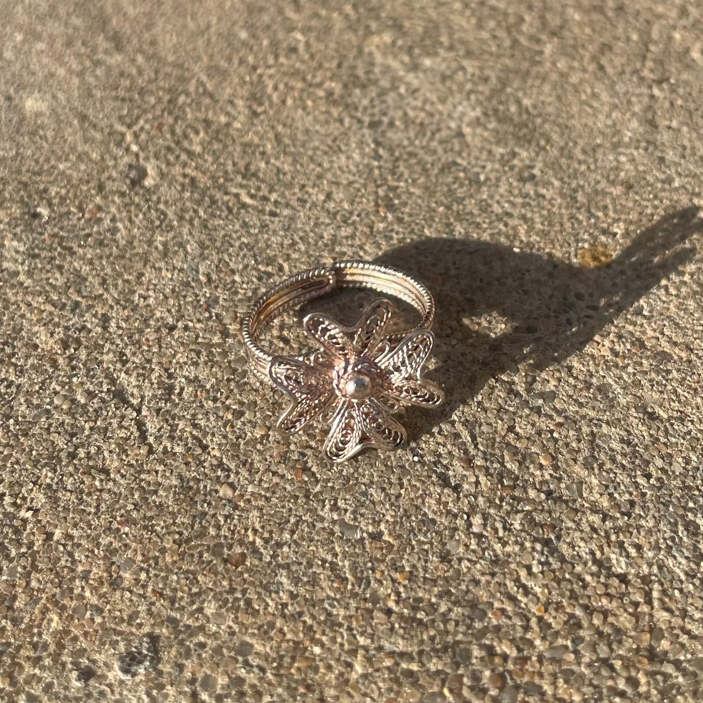 Silver ring with flower