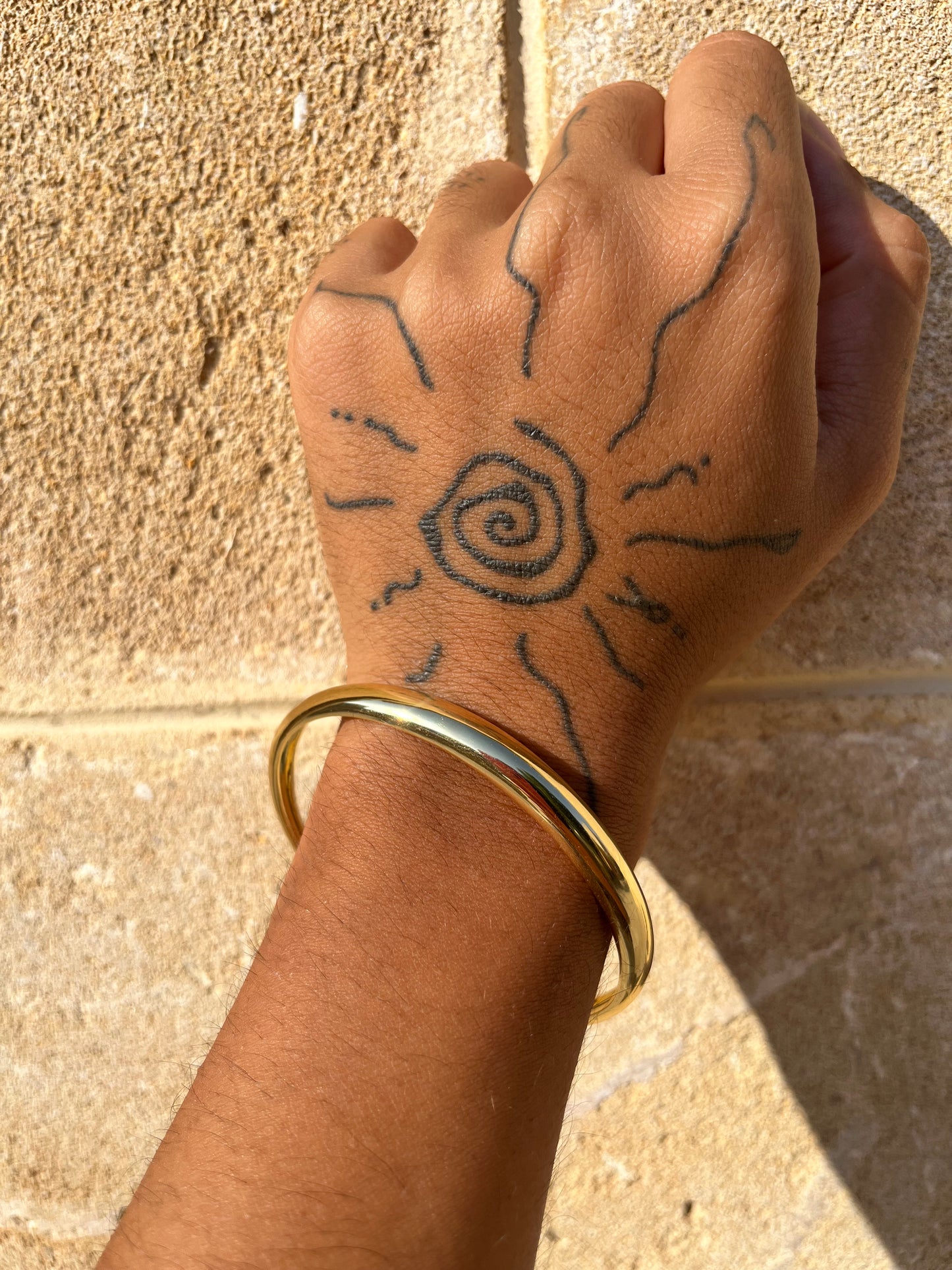Gold pleated hand cuff bracelet
