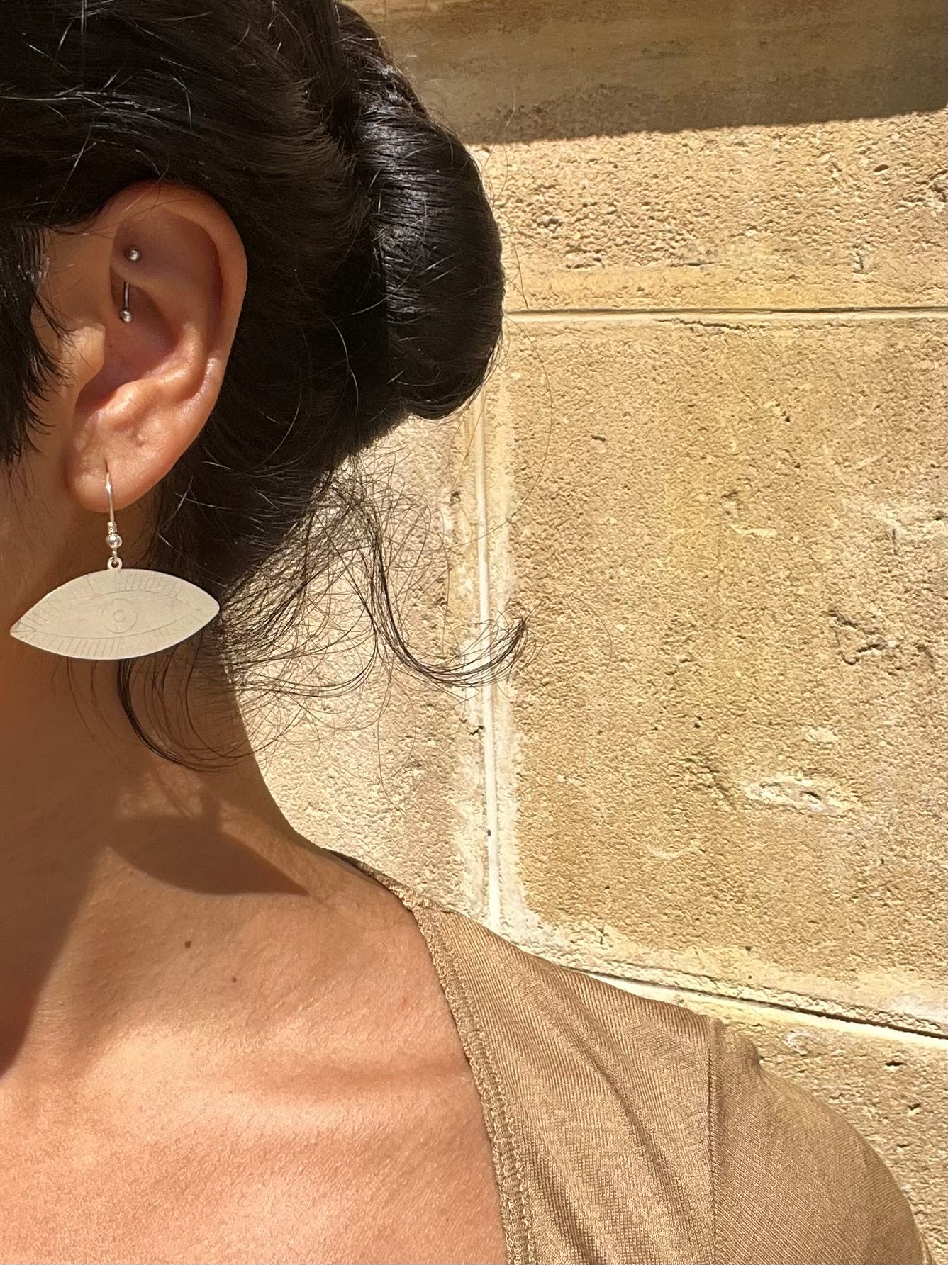 Silver eye earrings