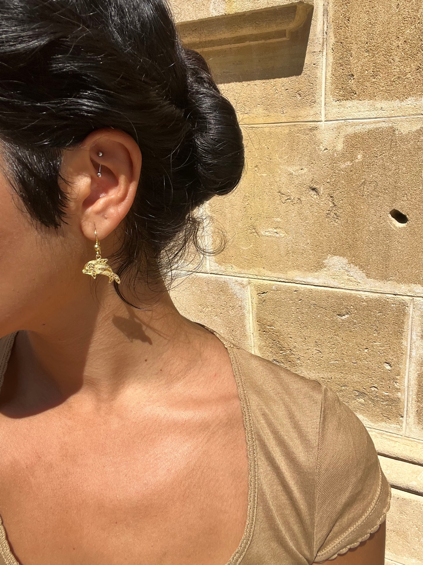 Gold dolphin earrings