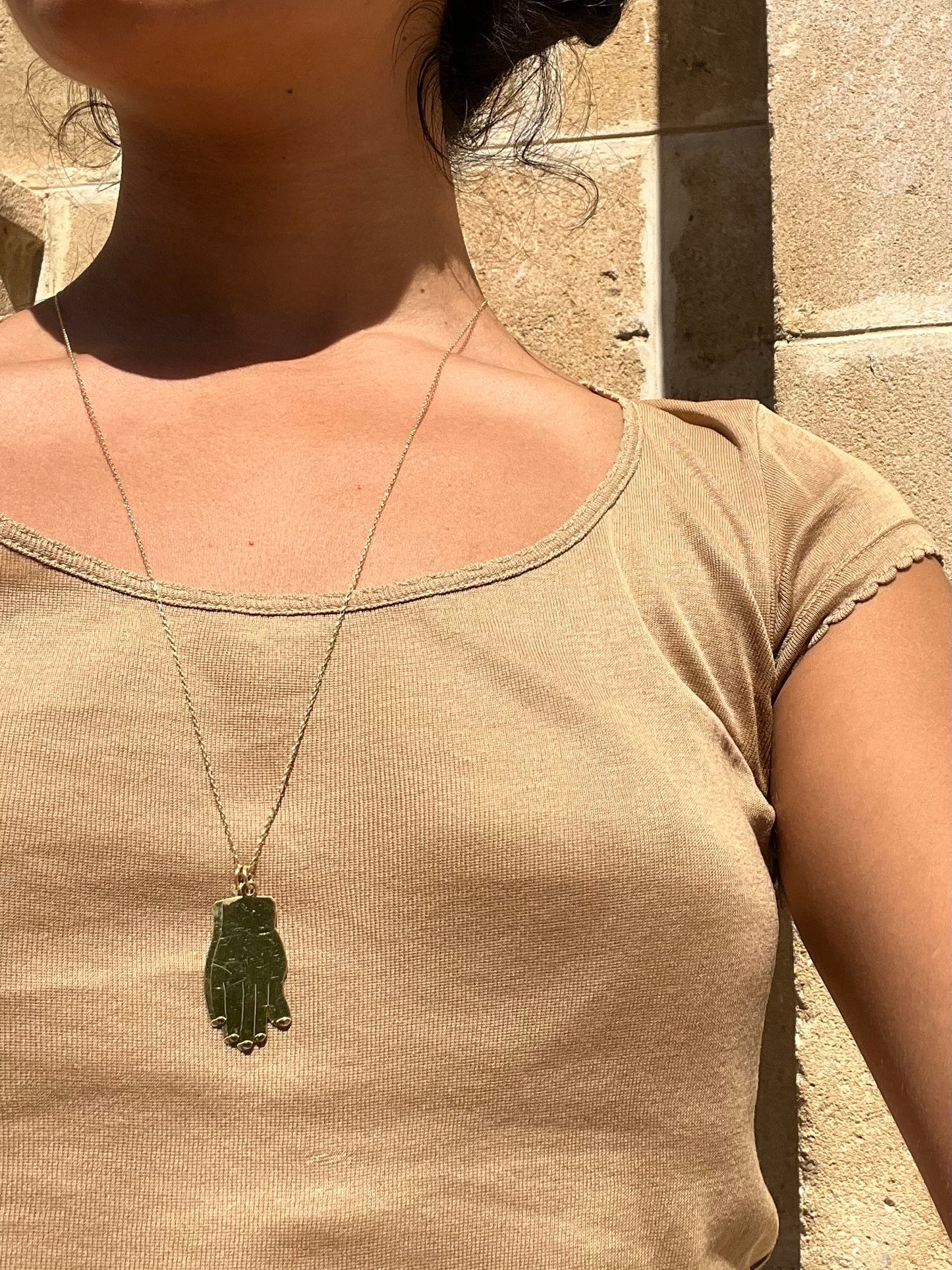 Gold hand necklace