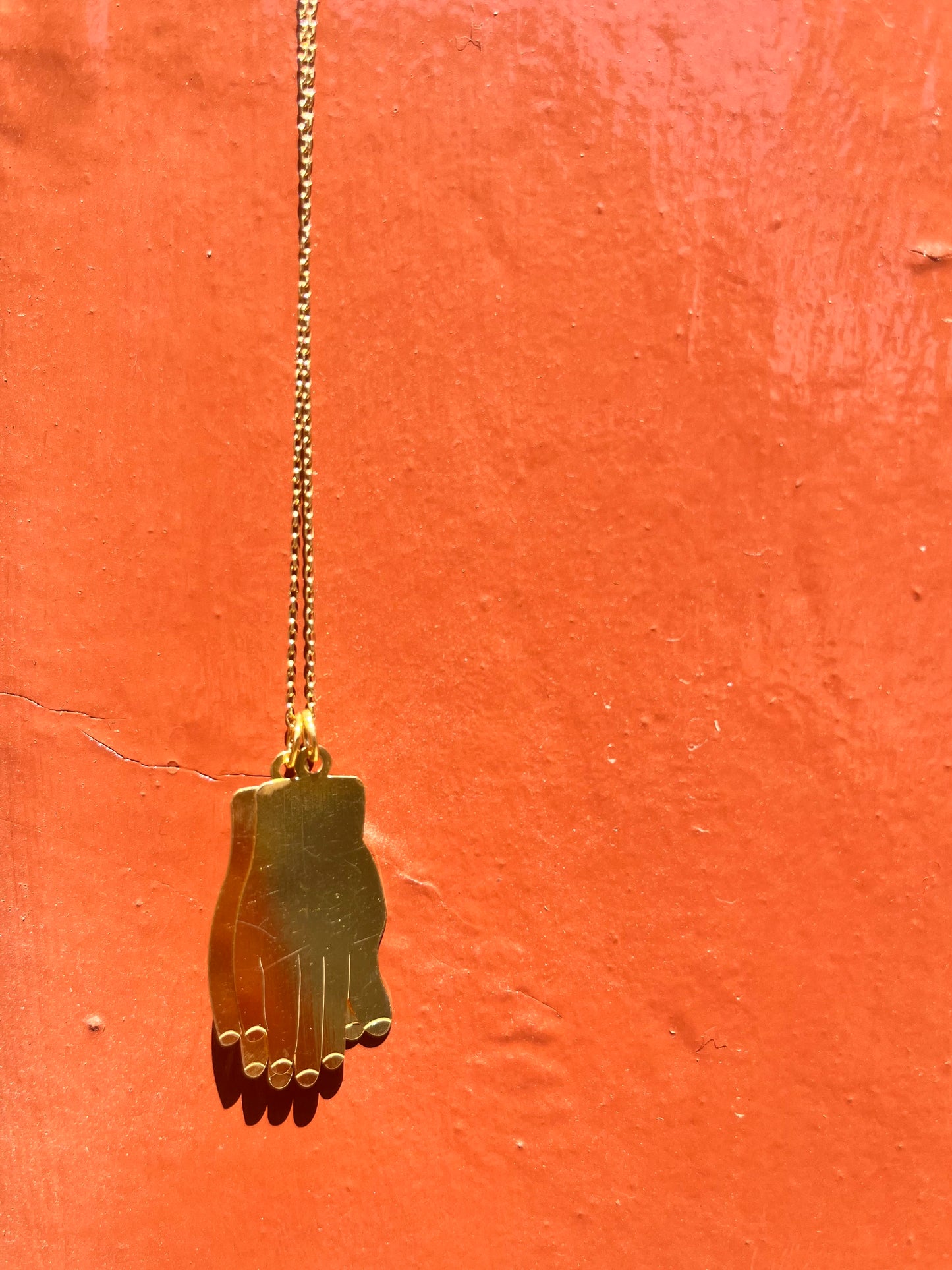 Gold hand necklace