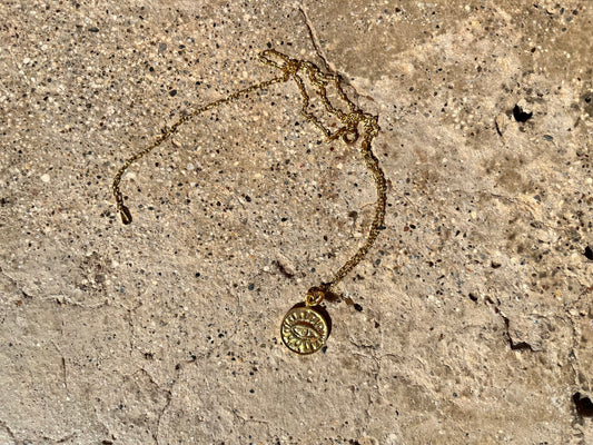 Gold eye necklace