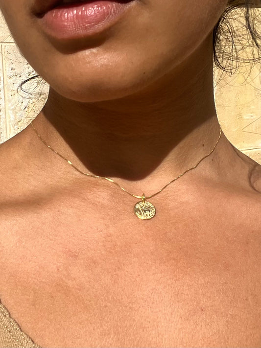 Gold mouflon necklace